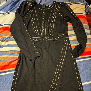 Black dress with gold embellishments